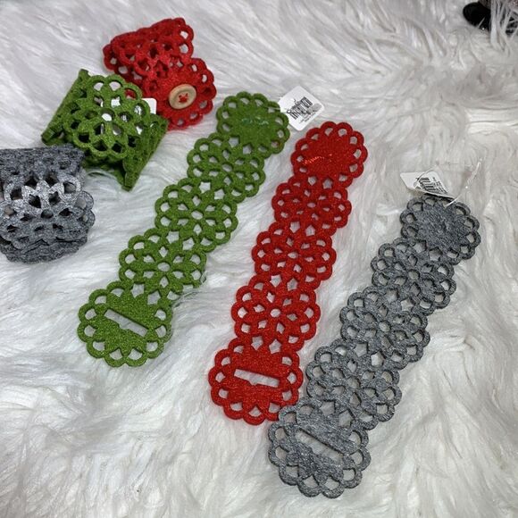 CRATE & Barrel 8 napkin rings  laser cut floral motif button closure NWT - Picture 3 of 7